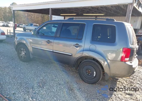 2010 Honda Pilot Touring z USA, uszkodzony, nr VIN 5FNYF3H99AB005660